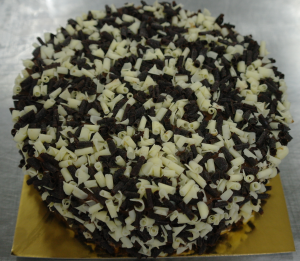 Chocolate cake with black and white chocolate curls